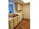 View of Kitchen featuring double sink, dishwasher, microwave, and wood flooring at 3550 Bay Sands Dr # 2016, Laughlin, NV 89029