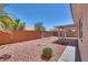 Wide backyard featuring desert landscaping with a covered patio at 3750 Horseshoe Mesa St, Las Vegas, NV 89147