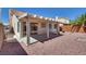 Backyard featuring desert landscaping and a covered patio at 3750 Horseshoe Mesa St, Las Vegas, NV 89147