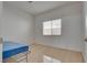 Bright bedroom with tile floors and natural light from the window at 3750 Horseshoe Mesa St, Las Vegas, NV 89147