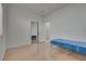Bedroom features tile floors, a sliding mirrored closet and natural light at 3750 Horseshoe Mesa St, Las Vegas, NV 89147