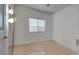 Bright bedroom with tile floors and natural light from the window at 3750 Horseshoe Mesa St, Las Vegas, NV 89147