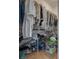 Walk-in closet with hanging rods, shelving, and storage containers at 3750 Horseshoe Mesa St, Las Vegas, NV 89147