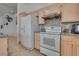 View of kitchen with stainless steel appliances, granite countertops, and tile floors at 3750 Horseshoe Mesa St, Las Vegas, NV 89147