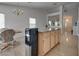 Open concept kitchen with island and granite countertops with tile floors at 3750 Horseshoe Mesa St, Las Vegas, NV 89147