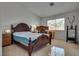 Main bedroom with beautiful furnishings, tile floors and natural light at 3750 Horseshoe Mesa St, Las Vegas, NV 89147