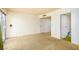 This carpeted bedroom has an entry door and an open door to another room at 3871 Sinclair St, Las Vegas, NV 89121
