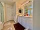 Bathroom featuring a double sink vanity with ample counter space and walk in shower at 4046 Sparrow Rock St, Las Vegas, NV 89129