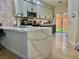 Modern kitchen with quartz countertops, stainless steel appliances, and ample cabinet space at 4046 Sparrow Rock St, Las Vegas, NV 89129