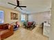 Open-concept living area with dining and living area and stylish decor at 4046 Sparrow Rock St, Las Vegas, NV 89129