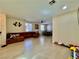 Spacious living area with a large sectional sofa, multiple windows, and an open layout at 4046 Sparrow Rock St, Las Vegas, NV 89129