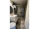 Modern bathroom with updated vanity, decorative tile, and a glass-enclosed shower at 4239 White Sands Ave, Las Vegas, NV 89121
