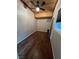 Compact bedroom with hardwood floors, wood ceilings, and natural lighting at 4239 White Sands Ave, Las Vegas, NV 89121