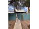 Charming two-story home with a well-maintained yard and a decorative cactus near the walkway at 4239 White Sands Ave, Las Vegas, NV 89121