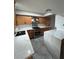 Updated kitchen featuring modern appliances, stone countertops, and ample cabinet space at 4239 White Sands Ave, Las Vegas, NV 89121
