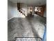 Spacious living room with a staircase and lovely herringbone-patterned floors at 4239 White Sands Ave, Las Vegas, NV 89121