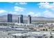 Expansive aerial view highlighting the city's architecture and mountain backdrop at 4471 Dean Martin Dr # 2204, Las Vegas, NV 89103