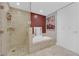 Luxurious bathroom with a tiled shower, soaking tub, and modern fixtures at 4471 Dean Martin Dr # 2204, Las Vegas, NV 89103
