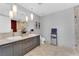 Modern bathroom featuring double sinks, marble floors, and a glass-enclosed shower at 4471 Dean Martin Dr # 2204, Las Vegas, NV 89103