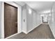 Light and airy hallway featuring neutral walls and patterned carpet at 4471 Dean Martin Dr # 2204, Las Vegas, NV 89103