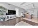 Open-concept space with a modern kitchen island and sleek entertainment center at 4471 Dean Martin Dr # 2204, Las Vegas, NV 89103