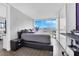 Bright bedroom with large windows boasting panoramic city views at 4471 Dean Martin Dr # 2204, Las Vegas, NV 89103