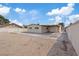 Backyard area featuring concrete patio and bare space that is ready for grass or landscaping at 4562 Scott Ave, Las Vegas, NV 89102