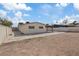 The spacious backyard features a concrete patio and an area ready for landscaping at 4562 Scott Ave, Las Vegas, NV 89102