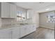 Open kitchen features granite countertops, stainless steel sink, and plenty of natural light at 4562 Scott Ave, Las Vegas, NV 89102