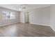 Spacious living room featuring sleek flooring, neutral paint, and lots of natural light at 4562 Scott Ave, Las Vegas, NV 89102