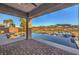 Serene backyard featuring a luxurious infinity pool and stunning mountain views, perfect for relaxation at 51 Reflection Cove Dr, Henderson, NV 89011