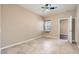 Comfortable bedroom featuring ceramic tile flooring and a ceiling fan at 5505 Criollo Dr, Las Vegas, NV 89122