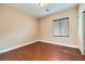 Bedroom with wood floors, natural light, and a closet for ample storage at 5505 Criollo Dr, Las Vegas, NV 89122