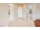 Inviting home entryway with ceramic tile, and a white front door at 5505 Criollo Dr, Las Vegas, NV 89122