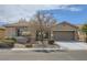 Charming single-story home with desert landscaping, an attached garage, and a well-maintained yard at 5505 Criollo Dr, Las Vegas, NV 89122