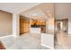 Open-concept kitchen featuring wood cabinets, granite counters, and stainless steel appliances at 5505 Criollo Dr, Las Vegas, NV 89122
