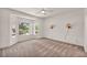 Comfortable bedroom featuring a large bay window offering natural light and outdoor views at 570 Cypress Gardens Pl, Henderson, NV 89012