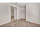 Carpeted bedroom with closet and entryway providing a welcoming and functional space at 570 Cypress Gardens Pl, Henderson, NV 89012