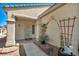 Charming home entrance with decorative plants and a secure front door at 570 Cypress Gardens Pl, Henderson, NV 89012