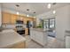 Bright kitchen featuring stainless steel appliances, an island, and access to the patio at 570 Cypress Gardens Pl, Henderson, NV 89012