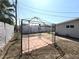 Backyard featuring a gazebo on a dirt lot with a white lattice fence at 620 N 16Th St, Las Vegas, NV 89101