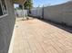 Brick patio with access gate surrounded by gravel and block wall at 620 N 16Th St, Las Vegas, NV 89101