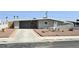 Charming single-story home with desert landscaping and a well-maintained front yard at 620 N 16Th St, Las Vegas, NV 89101