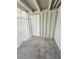 Enclosed storage area with concrete floor and wood plank walls at 620 N 16Th St, Las Vegas, NV 89101