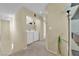 Hallway features a washer and dryer and natural light at 6217 Lone Cypress Ct, Las Vegas, NV 89141