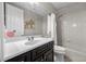 Full bathroom featuring a shower, tub, and stylish decor at 631 Coriander Canyon Ct, Las Vegas, NV 89138
