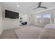 Bright bedroom showcasing the fireplace and providing seamless flow to living space at 631 Coriander Canyon Ct, Las Vegas, NV 89138