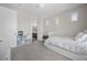 Charming bedroom with a cozy bed and access to an ensuite bathroom at 631 Coriander Canyon Ct, Las Vegas, NV 89138