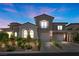 Elegant two-story home with well-manicured landscaping and a spacious two-car garage at 631 Coriander Canyon Ct, Las Vegas, NV 89138