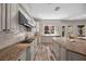 Spacious kitchen featuring granite countertops, stainless steel appliances, and modern cabinetry at 631 Coriander Canyon Ct, Las Vegas, NV 89138